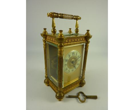 Late 19th century brass carriage clock with fluted columns and fretwork panels H13.5cm excluding handle 