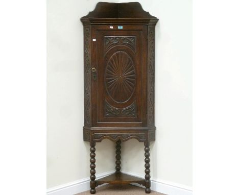 Victorian carved oak corner cupboard on turned bobbin stand, D(side to wall) 50cm x H180cm