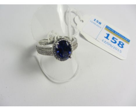 Blue stone set ring and a matching ring stamped 925