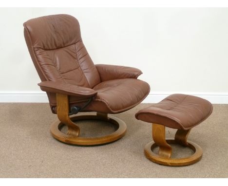 Stressless Ekornes reclining armchair chair upholstered in brown leather with matching footstool