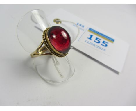 Garnet cabochon gold ring hallmarked 9ct