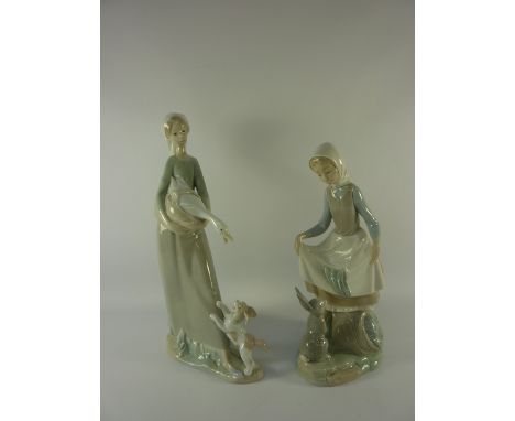 Lladro figure of a girl with a rabbit H23.5cm and a Nao figure of a girl with a goose (2)