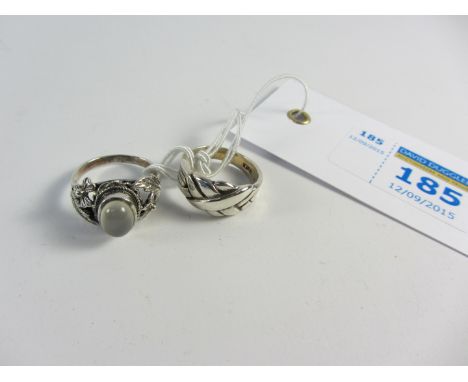 Moonstone ring and a silver knot ring stamped silver