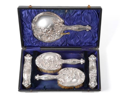 An Edward VII Silver Five-Piece Dressing-Table Service, by Jones and Crompton, Birmingham, 1908, each piece stamped with Art 