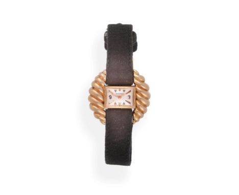 A Lady's 18ct Gold Back Winding Wristwatch with an Unusual Shell Form Case Sides, signed Jaeger LeCoultre, circa 1955, lever 