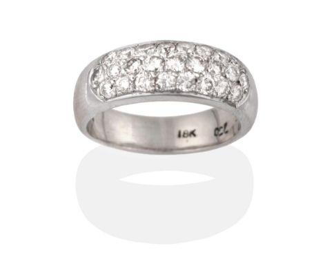 A Diamond Bombé Cluster Ring, three rows of round brilliant cut diamonds pavé set on a plain polished shank, total estimated 