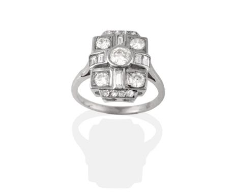 An Art Deco Style Diamond Cluster Ring, the plaque form inset with round brilliant and baguette cut diamonds in white claw an