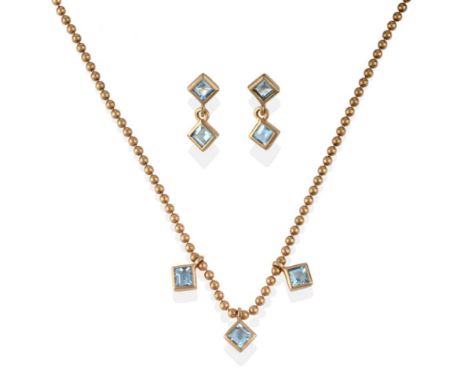 A 9 Carat Gold Aquamarine Necklace and Earring Set, the necklace of bead links with three square step cut aquamarines in yell