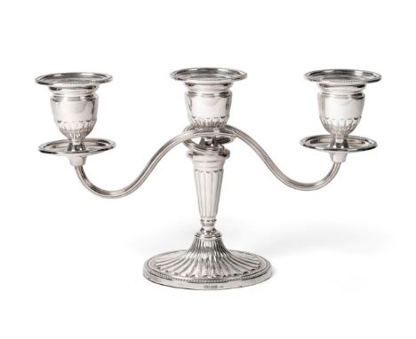 An Elizabeth II Silver Three-Light Candelabra, by C. J. Vander, Sheffield, 1997, on fluted and beaded oval base, the tapering