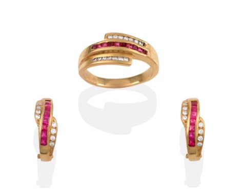 A Ruby and Diamond Ring, channel set square step cut rubies with a row of channel set round brilliant cut diamonds staggered 