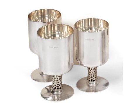 Three Elizabeth II Silver Wine-Cups, by James Dixon and Sons, Sheffield, 1972 and 1974, of Stuart Devlin influence, the plain