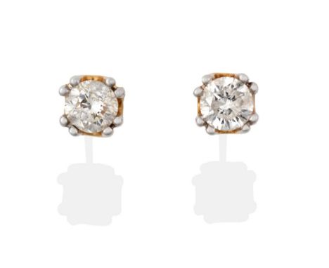 A Pair of 18 Carat Gold Diamond Solitaire Earrings, the round brilliant cut diamonds in white double claw settings to yellow 