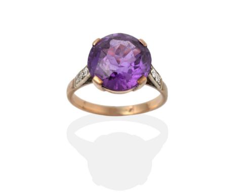 A Synthetic Sapphire Ring, the round brilliant cut synthetic sapphire simulating alexandrite in yellow claw settings, to old 