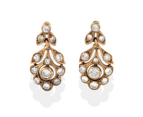 A Pair of Floral Drop Earrings, the floral and foliate drops of pierced mounts inset with round brilliant cut diamonds, total