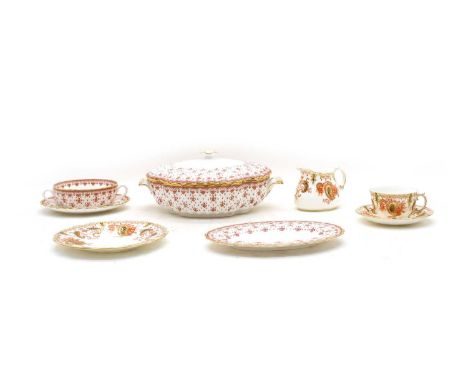 A Royal Crown Derby tea service, decorated in the Imari palette comprising nine cups, nine saucers, cream jug and a sugar bow