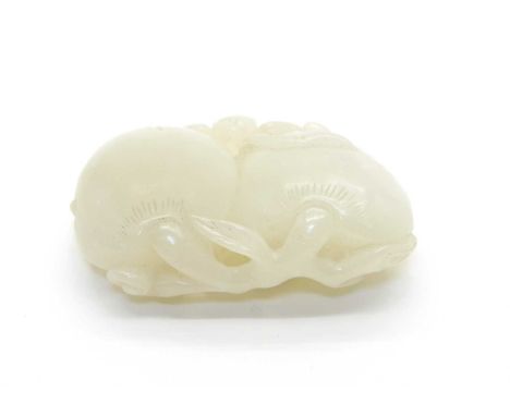 A white jade group of two peaches, a lingzhi and a bat