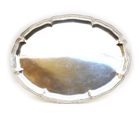 A Swiss oval silver tray, stamped 830 and 16548. 40oz. 48cm long, 38cm wideCondition report: Good condition, but all over sur