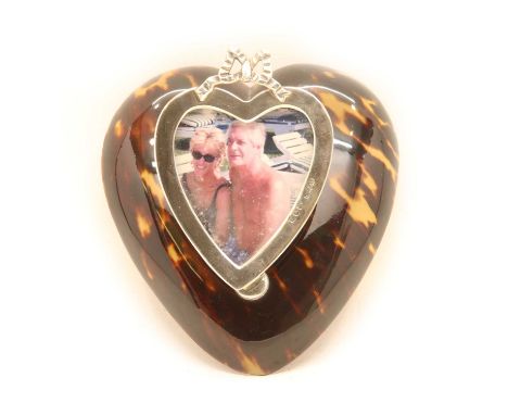 A silver and Tortoishell heart shaped desk paper clip, with integrated photograph frame, by Andrew Barrett &amp; Sons, London