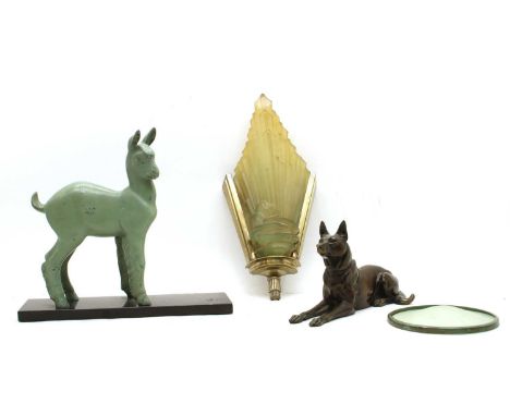 Various Art Deco figures, comprising a figure of a kid on a marble base, a large plaster figure of a woman (damaged, missing 