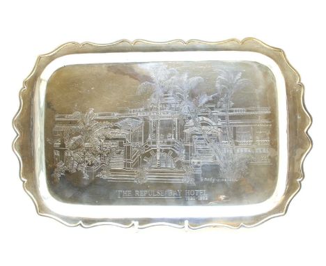 A Sterling silver rectangular tray, machine engraved 'The Repulse Bay Hotel 1920-1982' signed Andy C Neilson, 36cm wide, 24 o