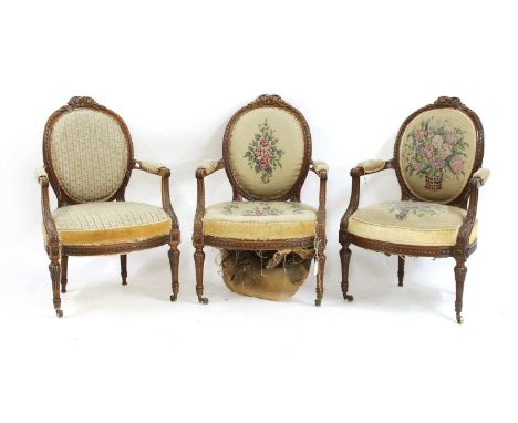 Set of three walnut mid 19th century drawing room chairs, copies of Louis XVI style. Tapestry seats and backs worked by Lady 