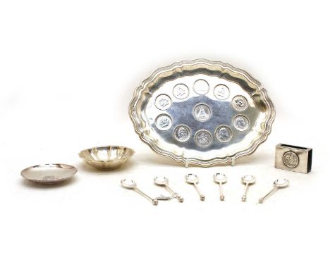 Silver items: an Austrian silver coin dish, stamped 800 with 11 various inset coins 1929-1937, 26 x 20cm two small dishes, on