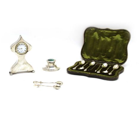 Various silver items, comprising: a small silver cased clock with watch movement, Birmingham 1913, 14.5cm high, a small circu