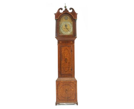 A 19th century inlaid oak and mahogany longcase clock, the arch topped face with a 12in silvered dial, with Arabic hour marke