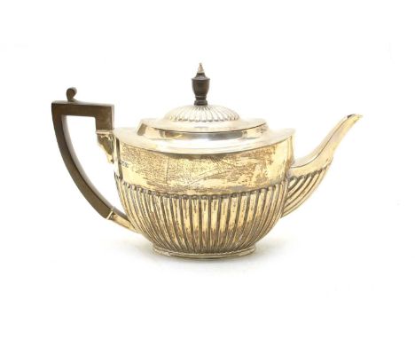 An Edwardian silver teapot, by William Hutton &amp; Sons Ltd, Birmingham 1909, part fluted decoration, 28cm long, approximate