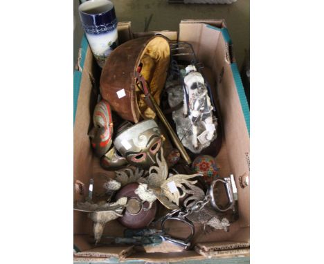 A crate containing a riding hat, vintage camera, fighting cocks, etc.