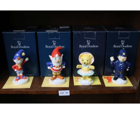 A shelf containing four Royal Doulton characters from Enid Blyton's Noddy. boxed with certificates