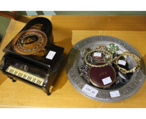 A vintage miniature wooden piano musical jewellery box, together with a metal plate containing costume jewellery