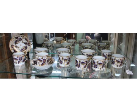 A quantity of table ceramics, c 1810, comprising seven coffee cans, three tea cups and two saucers, cobalt blue and gilded ac