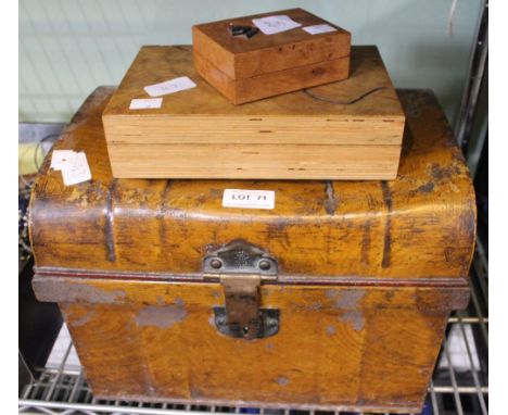 A small tin trunk with two wooden boxes