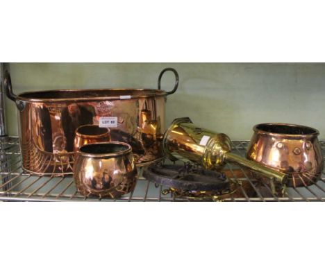 A copper two handled vessel, stamped "A Smith makers Stratford-upon-Avon, a brass clockwork spit engine with weight and hangi