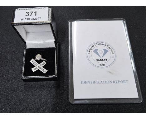 1.25 CARAT SOLITAIRE DIAMOND RING WITH CERTIFICATE REPORT ON 18 CARAT WHITE GOLD SHANK     