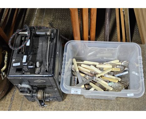 QUANTITY OF USING BONE HANDLED CUTLERY AND THE AGFA PROJECTOR     