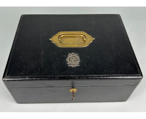 AN ASPREYS AND SONS BLACK LEATHER TRAVELLING CASE OR JEWELLERY BOX, 33cm w x 24cm d x 14cm h Sunken brass handle, mounted wit