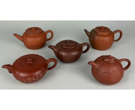 A COLLECTION OF FIVE CHINESE YIXING CLAY TEA POTS, Of globular shape, some with calligraphy and seal marks. 