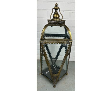 A SINGLE ANTIQUE METAL AND GLASS GARDEN LANTERN, 65cm h Used condition with marks consistent with age and wear. 