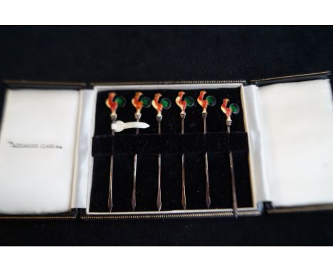 Cased set of 6 silver and enamel cocktail stick with cockerel terminals by Alexandra clarke 