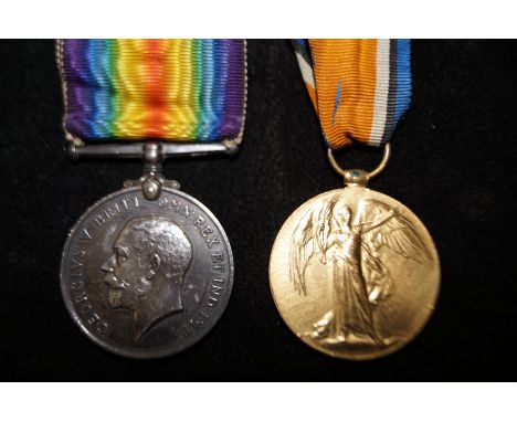 Great war medal pair awarded to 75174 PTE. J. Heaton. Manch. R