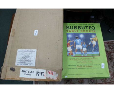 A BOXED TABLETOP SKITTLES GAME together with a Subbuteo table soccer game 