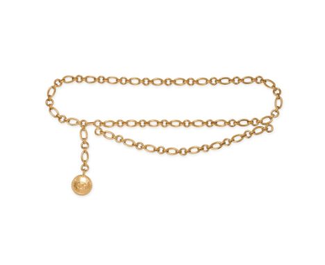 NO RESERVE - CHANEL, A VINTAGE BELT comprising a chain link belt suspending a circular CC pendant, signed Chanel, 80.0cm, 219