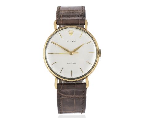 Rolex. A 9K gold manual wind wristwatch with milled bezelModel: PrecisionDate: London Hallmark for 1965Movement: 17-jewel Cal