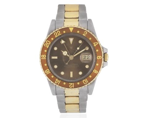 Rolex. A stainless steel and gold automatic calendar bracelet watch with dual time zoneModel: GMT MasterReference: 16753Date: