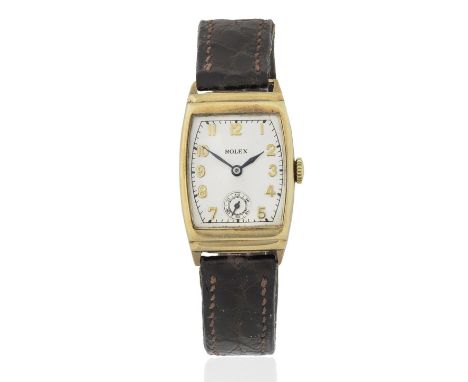 Rolex. A 9K gold manual wind tonneau form wristwatchReference: 2387Date: Circa 1930Movement: 15-jewel manual wind Dial: Silve