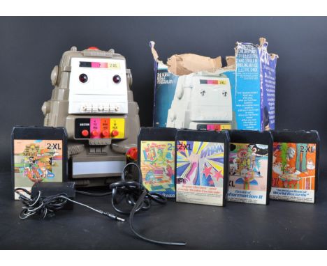 A vintage 1970s (1978) Mego / Burbank Toys 2-XL talking robot with cartridges / cassette tapes. The interactive robot with ed