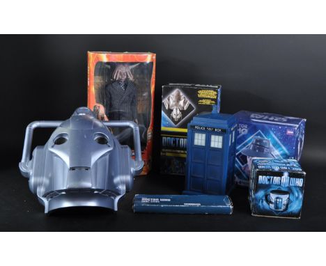 Doctor Who - a collection of assorted memorabilia to include; a Cyberman electronic helmet, a boxed Four Doctor Ceramic 3D Mu