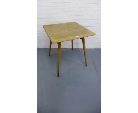 A retro Ercol dining table having a moulded square top raised on turned supports, 70 x 74cm 